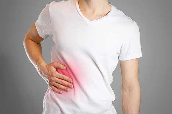 The liver, about the size of a football, is the body's largest internal organ. It sits on the right side of your body just under your rib cage.